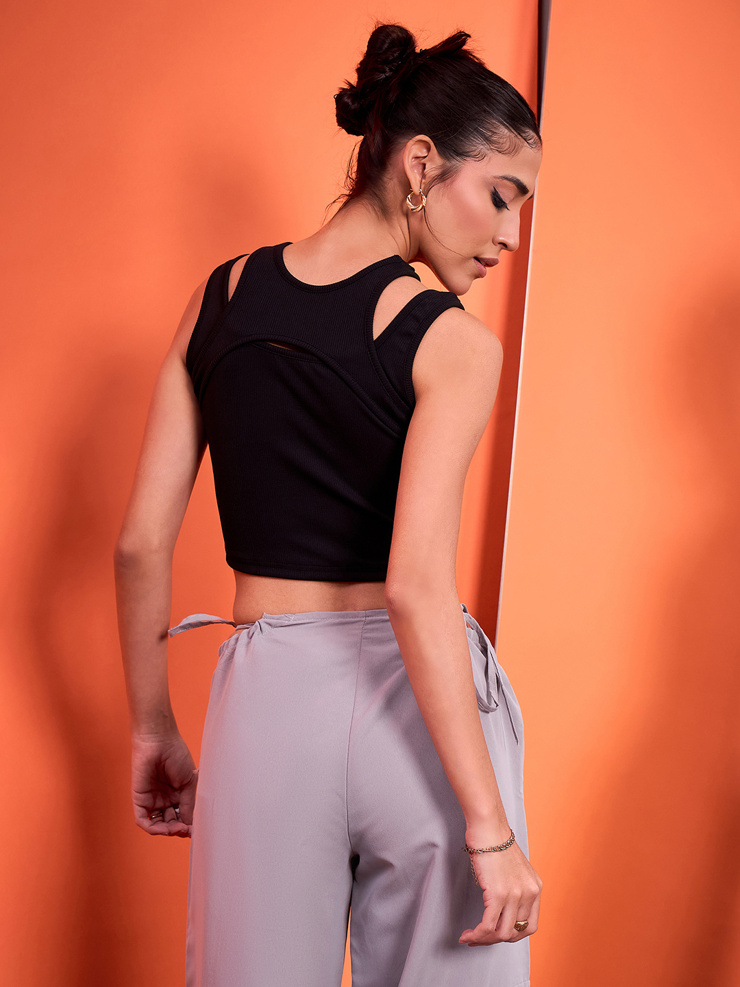 Sleeveless Stretchable Ribbed Top with Front Cut Outs - Uptownie